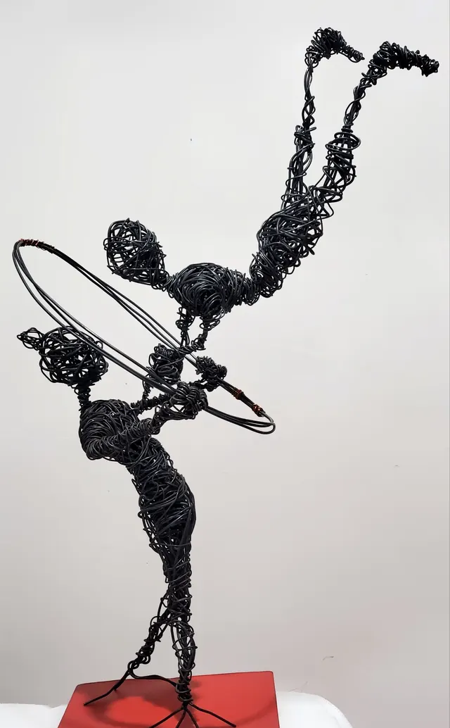 Hoop acrobats — wire sculpture by Pouya