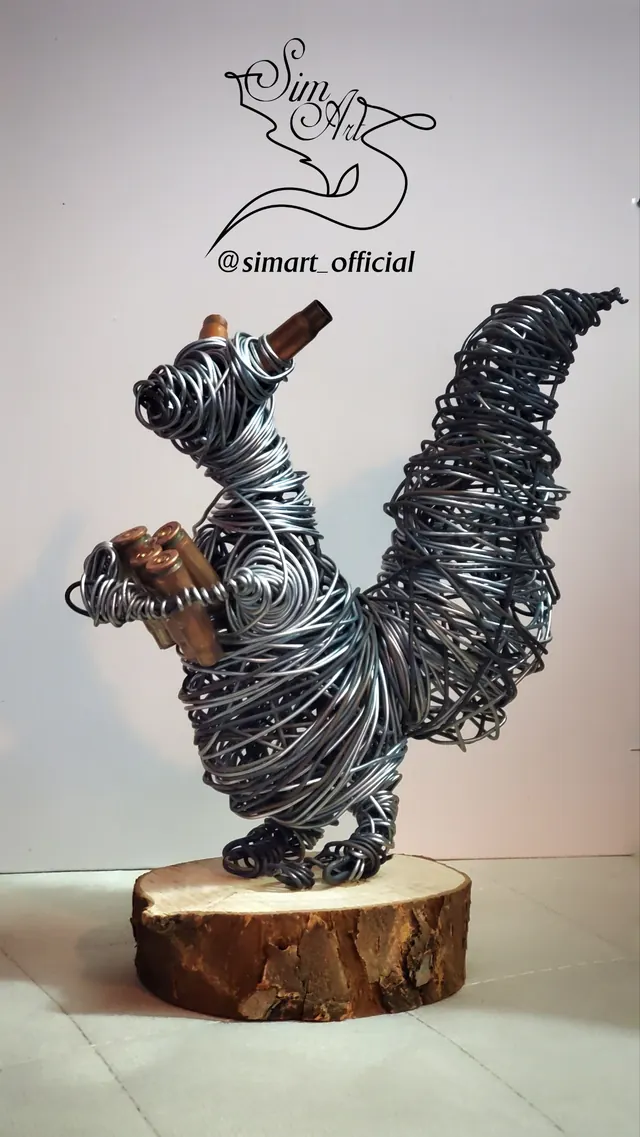Squirrel with casings — wire sculpture by Pouya