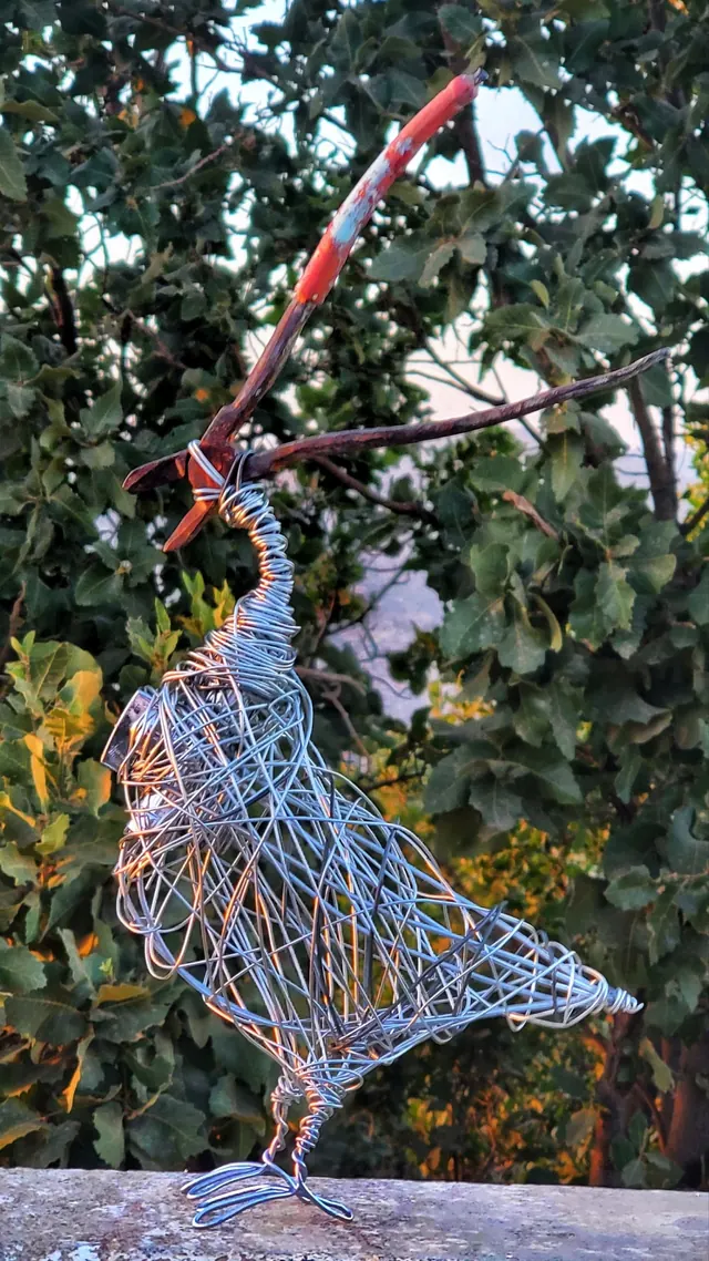 Bird with a pliers head — wire sculpture by Pouya