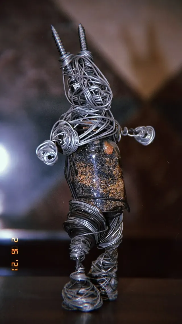 Rabbit with screw ears — wire sculpture by Pouya