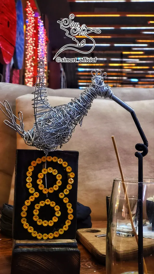 Crane on a screw block — wire sculpture by Pouya