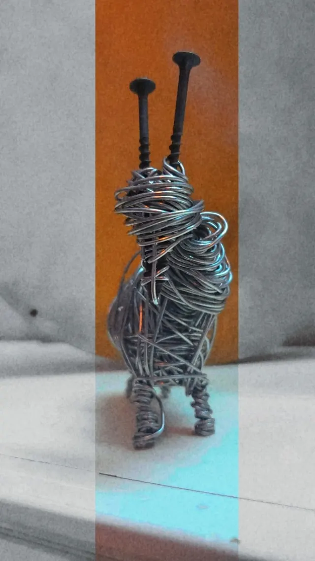 Snail with nail antennae — wire sculpture by Pouya